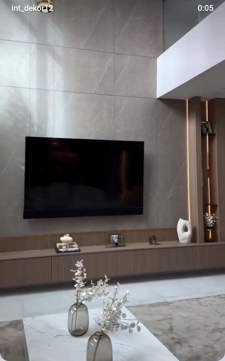 Real completed living room console and TV unit with warm wood tones, Innovative Dekor Lucknow project