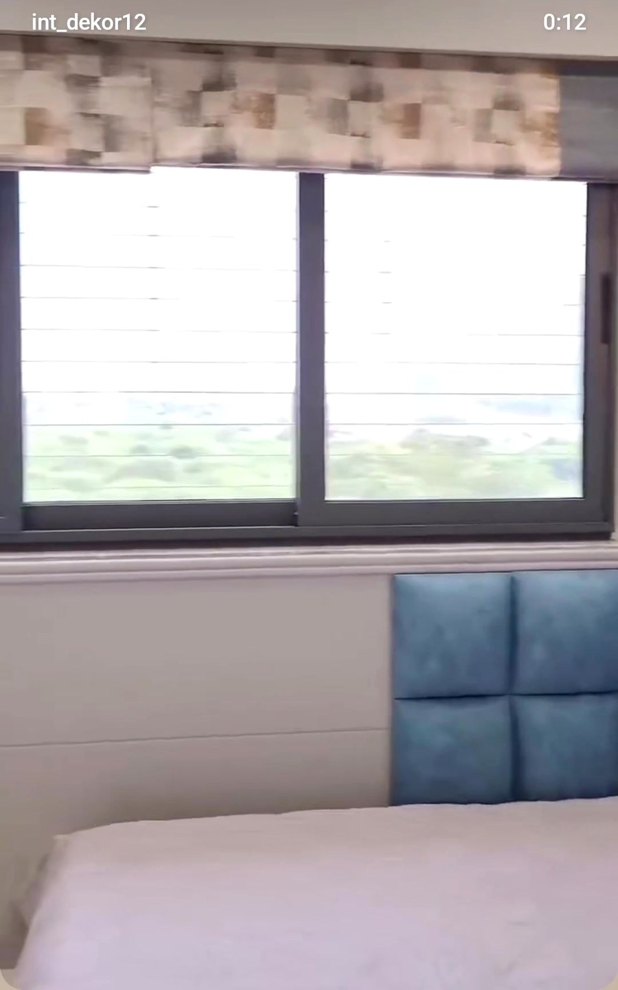 Real completed bedroom window seat with blue tufted headboard, Innovative Dekor Lucknow project